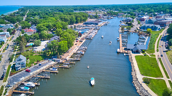 Image of River in country lined with docks and boats