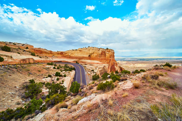 istock Road curving through desert canyon 1491318950