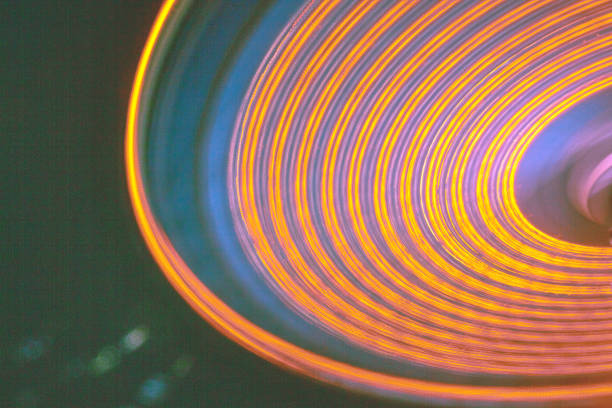 istock Saturn type rings from a fair or carnival ride at night 1491319881