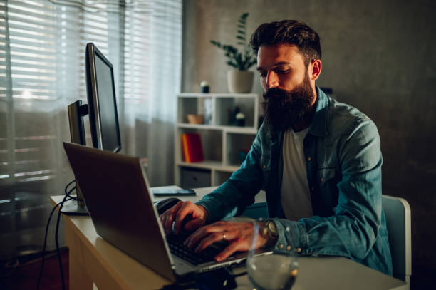 istock A data entry scientist typing on his laptop while sitting at his modern home office. 1491320527