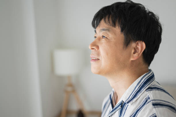 istock Middle-aged man drinking coffee in bed in the morning 1491320530