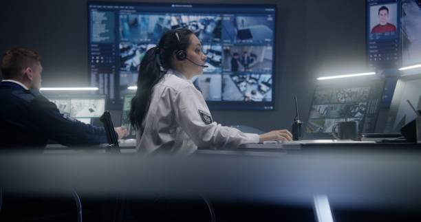 istock Female operator work in police surveillance room 1491323887