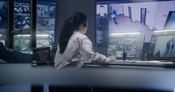 istock Female operator work in police surveillance room 1491324049