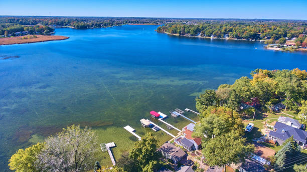 istock View above lake properties on bright blue lake with docks 1491324069