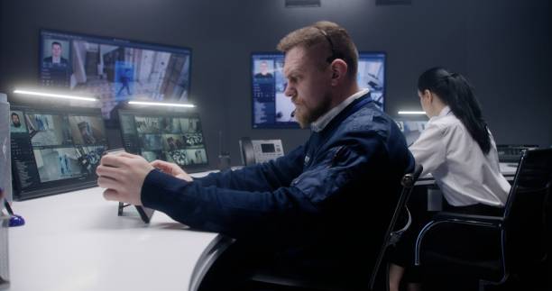 istock Security officer touches tablet and controls CCTV cameras 1491324829