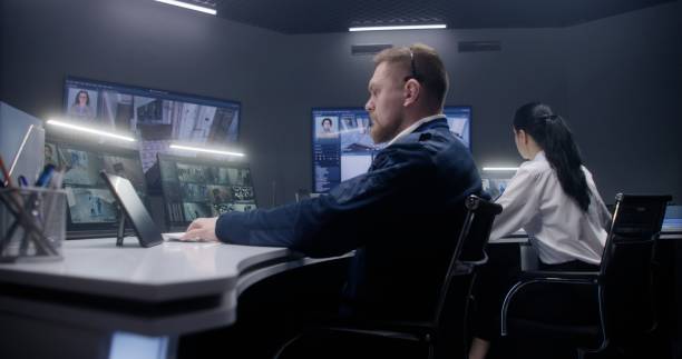 istock Security officer touches tablet and controls CCTV cameras 1491324924