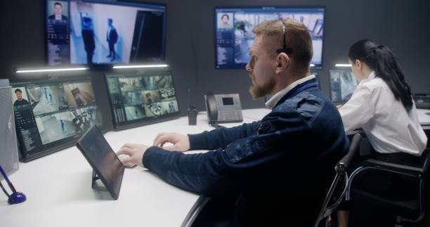istock Security officer touches tablet and controls CCTV cameras 1491325004