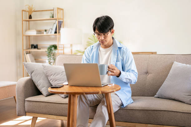 istock Businessman in casual is sitting comfortable sofa to thoughtful 1491326660