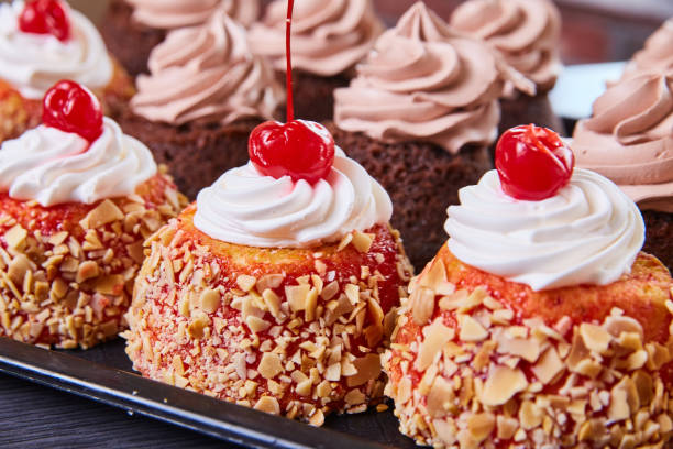 istock Yummy bakery mexican pastries with whipped cream and cherries 1491326888