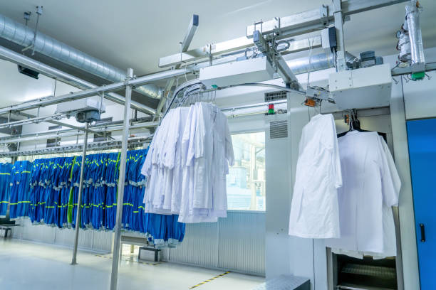 istock Washed clothes are being conveyed to ironing machine 1491329841