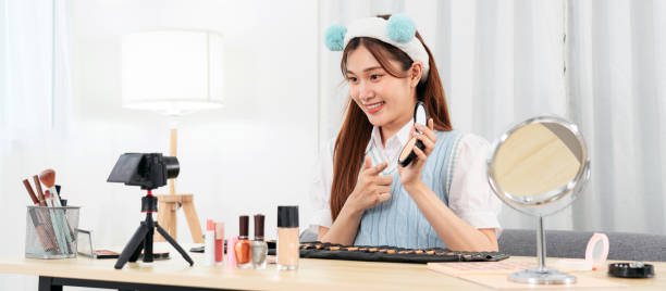 istock Young beauty influencer is showing powder product to testing and 1491330663