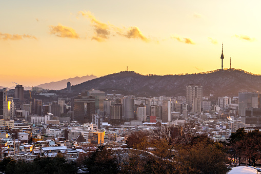Cityscap of seoul city from top of mountain at sunset, South korea