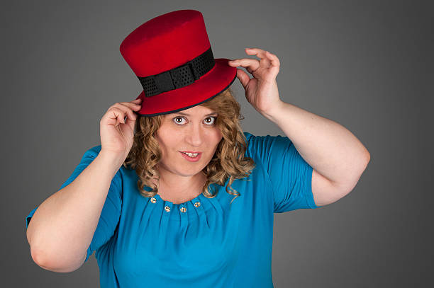 istock smiling fat woman on gray background 149133499