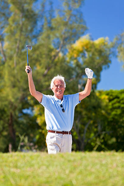 istock Happy Senior Man Celebrating Playing Golf 149133513