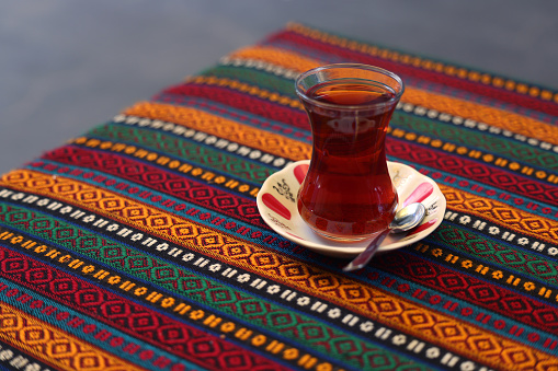 The glass of Turkish tea on the table