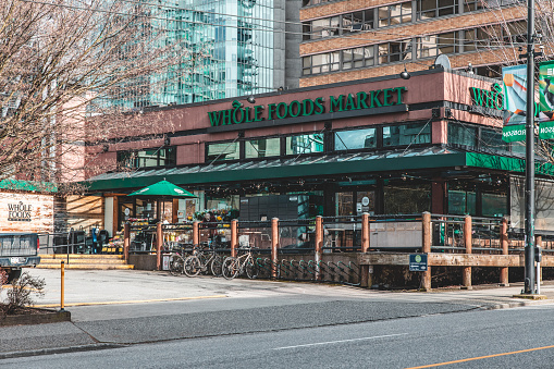 Vancouver, Canada - March 7, 2023: The photograph showcases the prominent Whole Foods Store located on Robson Street