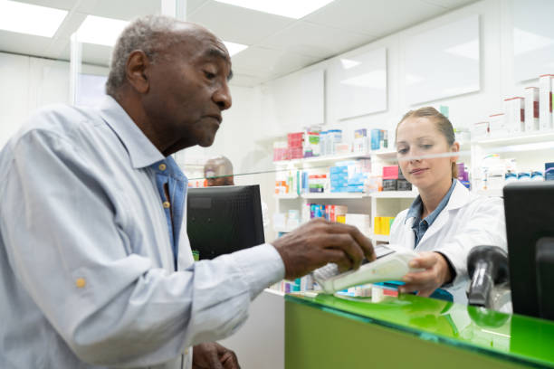 istock Senior man paying contactless at Pharmacy 1491342909