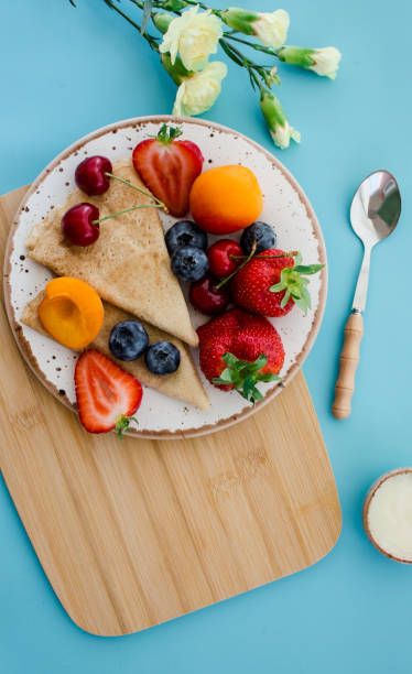 istock healthy breakfast fresh pancakes, berries and fruits 1491342977
