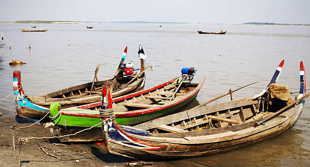 istock Fishermen boat on Ayeyarwaddy river in Myanmar 149134502