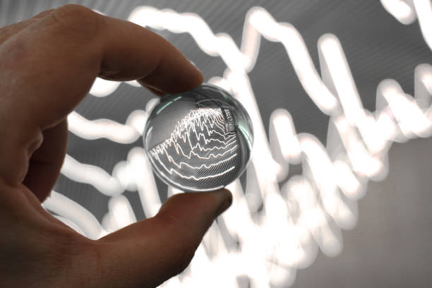 istock Cropped hand holding a crystal ball against light 1491353137