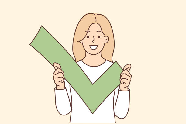 istock Woman holds green check mark for sign approval and successful account verification in social network 1491357002