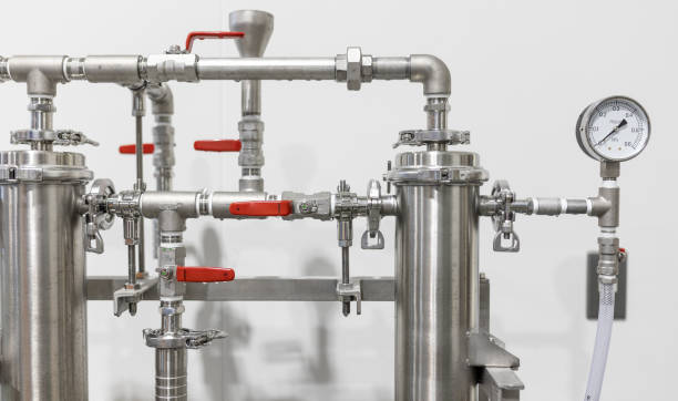 Factory machine pipes and tanks close up