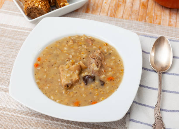istock Pork and mushroom soup with vegetables and pearl barley 1491364606