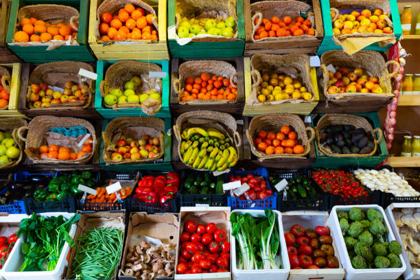 istock Fruits and vegetables on shelves in supermarket 1491365083