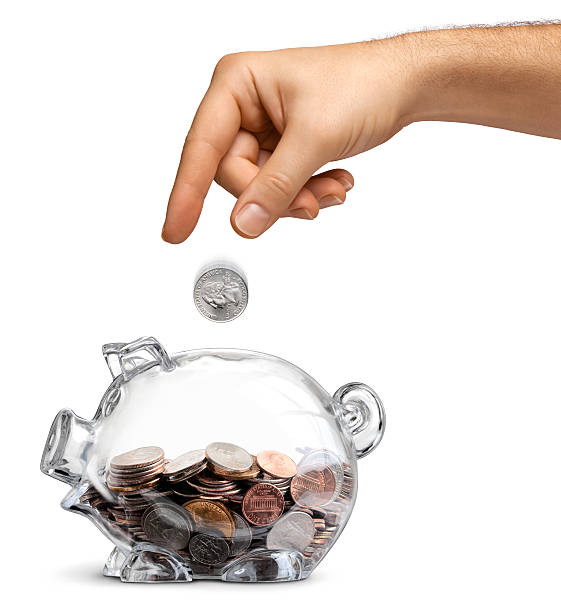 istock Piggy Bank Savings - Male 149136925