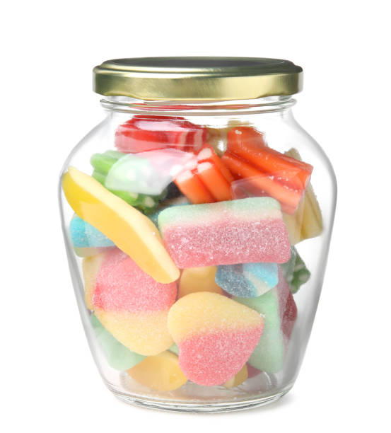 istock Tasty jelly candies in jar on white background 1491369595