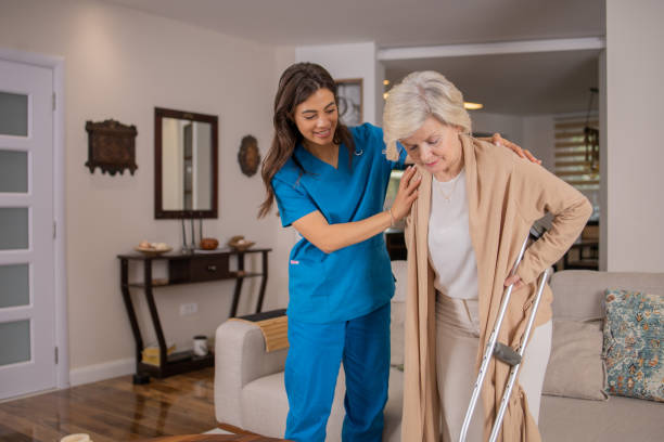istock Nurse helping senior woman 1491375881