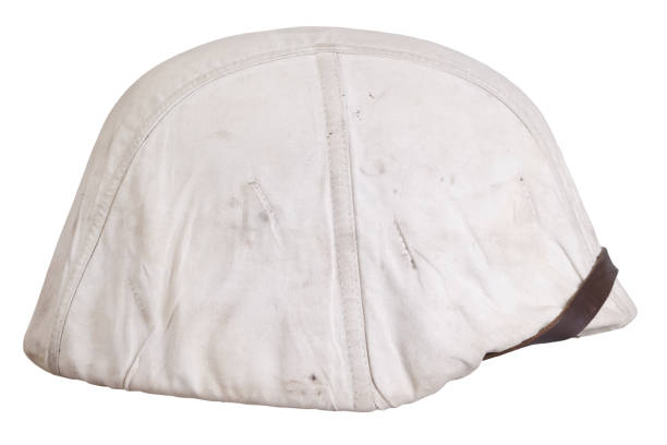 istock Army helmet with white winter camouflage cover 1491377390