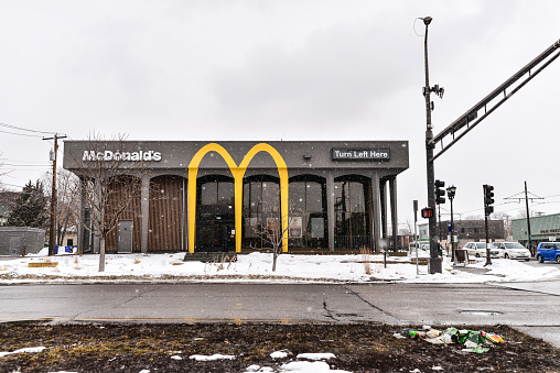 St. Paul, Minnesota, USA - 03/09/2023: Newly Painted Tall Arches on Building. McDonald's is a chain of fast food restaurants.