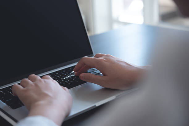 istock Close up, woman hands typing on laptop computer keyboard, surfing the internet on office table, online, working, business and technology, internet network communication concept 1491382859
