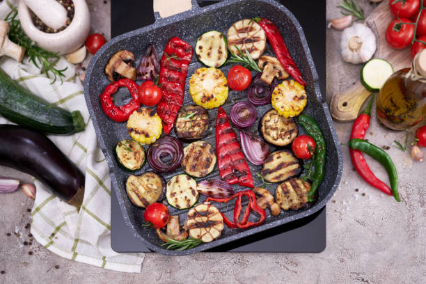 istock Grilled vegetables on grill pan at domestic kitchen 1491387679