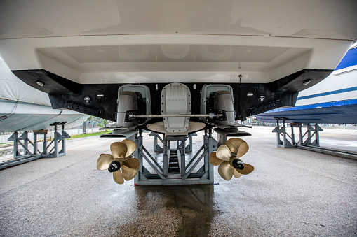 Passenger airplanes under maintenance. Checking mechanical systems for flight operations. Panorama of aircrafts in the hangar