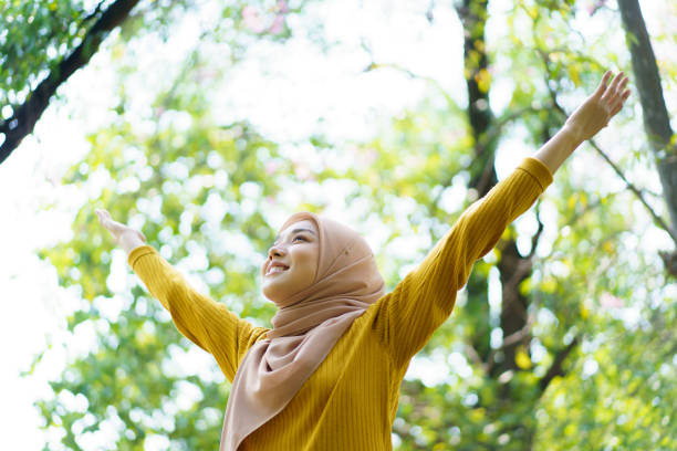 istock Muslim woman workout in a park. 1491397358