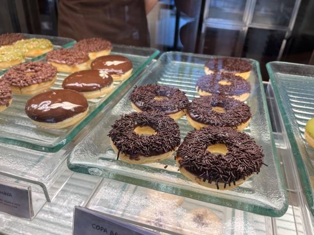 istock Glazed donuts with chocolate sprinkles topping 1491399520