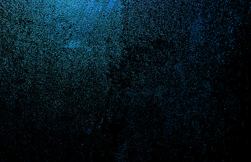 blue dark white shiny glitter abstract background with space. Twinkling glow stars effect. Like outer space, night sky, universe. Rusty, rough surface, grain.