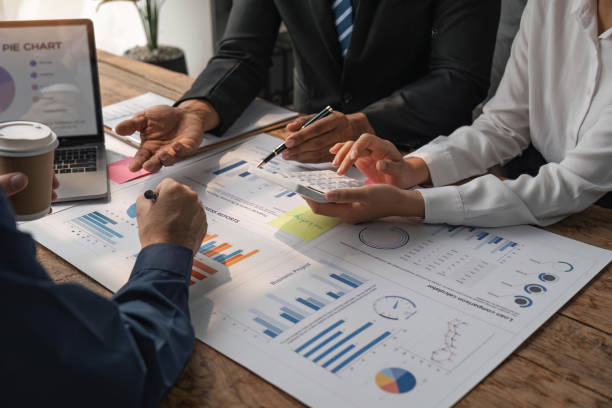 istock Meeting business team advisor about financial graph chart showing results are analyzing and calculating with calculator planning strategy 1491403500