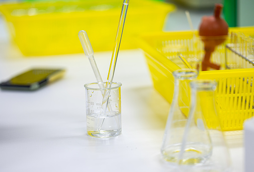 Acid-base reaction titration in Laboratory.