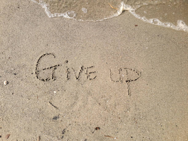 istock there is a give up writing on the beach sand 1491404642
