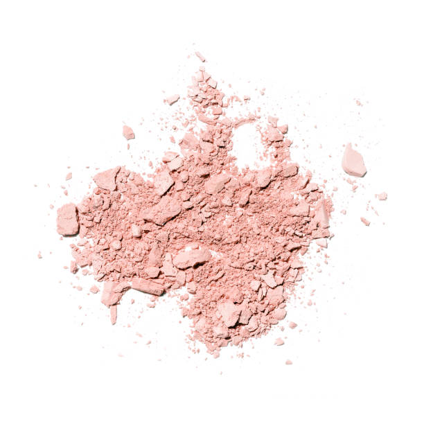 istock Make up crushed and broken brown eyeshadow on white background. Texture of crushed bronz powder 1491412115