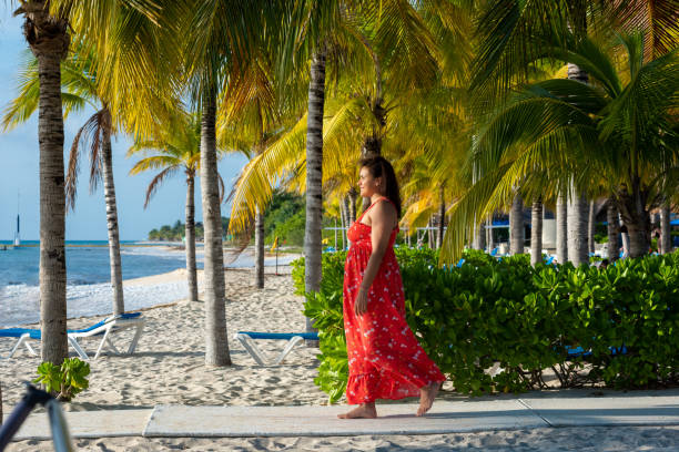 istock Woman in vacation at the beach 1491418274