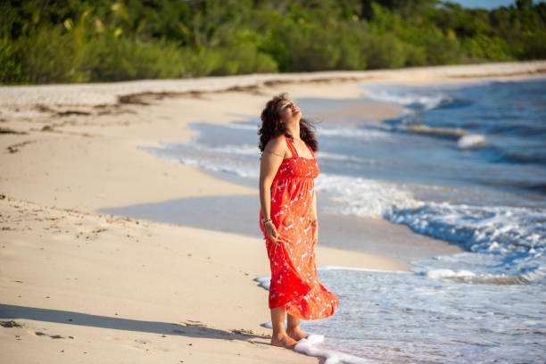 istock Woman in vacation at the beach 1491419140