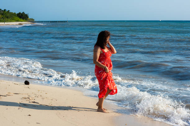 istock Woman in vacation at the beach 1491419141