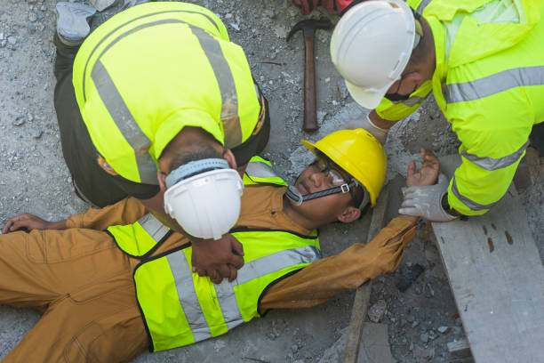 istock A construction worker had an accident at work, fell from a height, seriously injured. First aid to save the lives of construction site workers in an accident. 1491423157