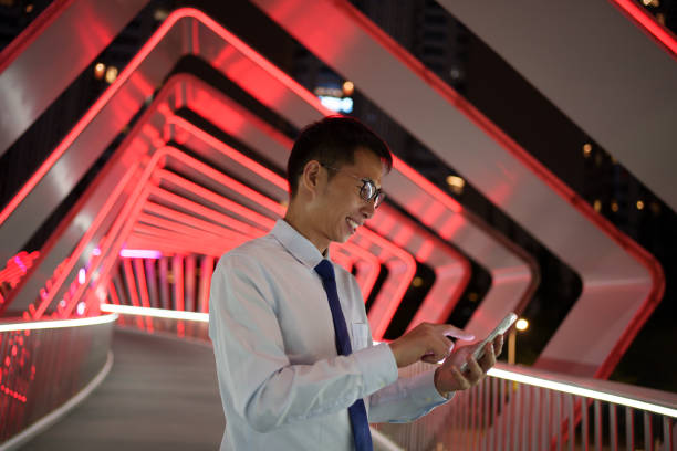 istock business people checking information on mobile phone 1491427793