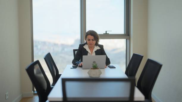 istock Businesswoman working in her office 1491428183