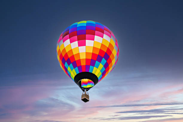 istock Hot air balloon flight over the sky at sunset 1491434312